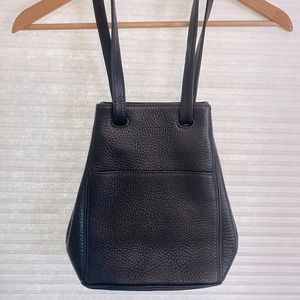 Vintage 90’s Coach leather bag. Pebbled black leather with unique strap.